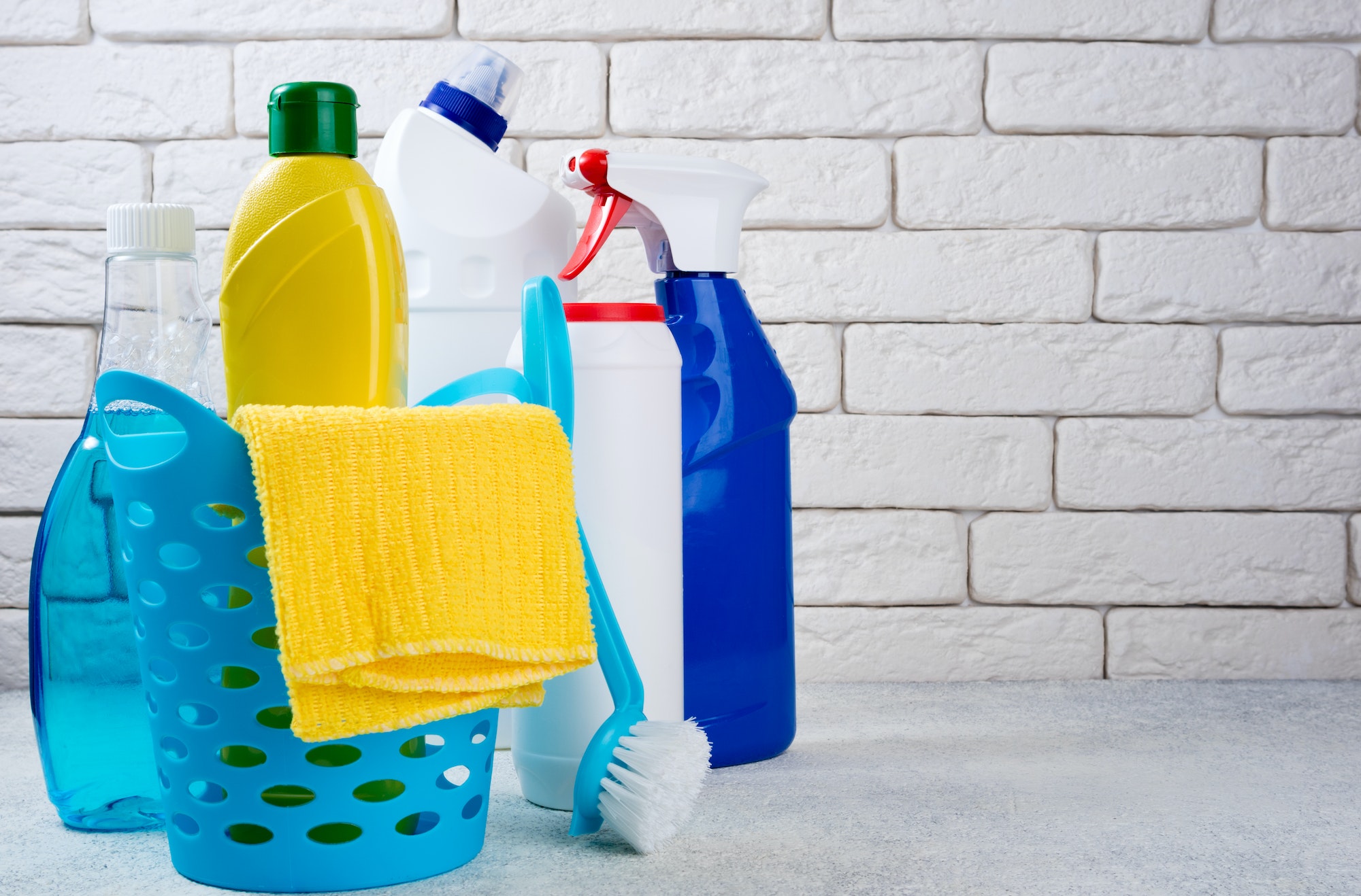 Cleaning background. Basket with cleaning products. Cleaning with supplies, service and clean house